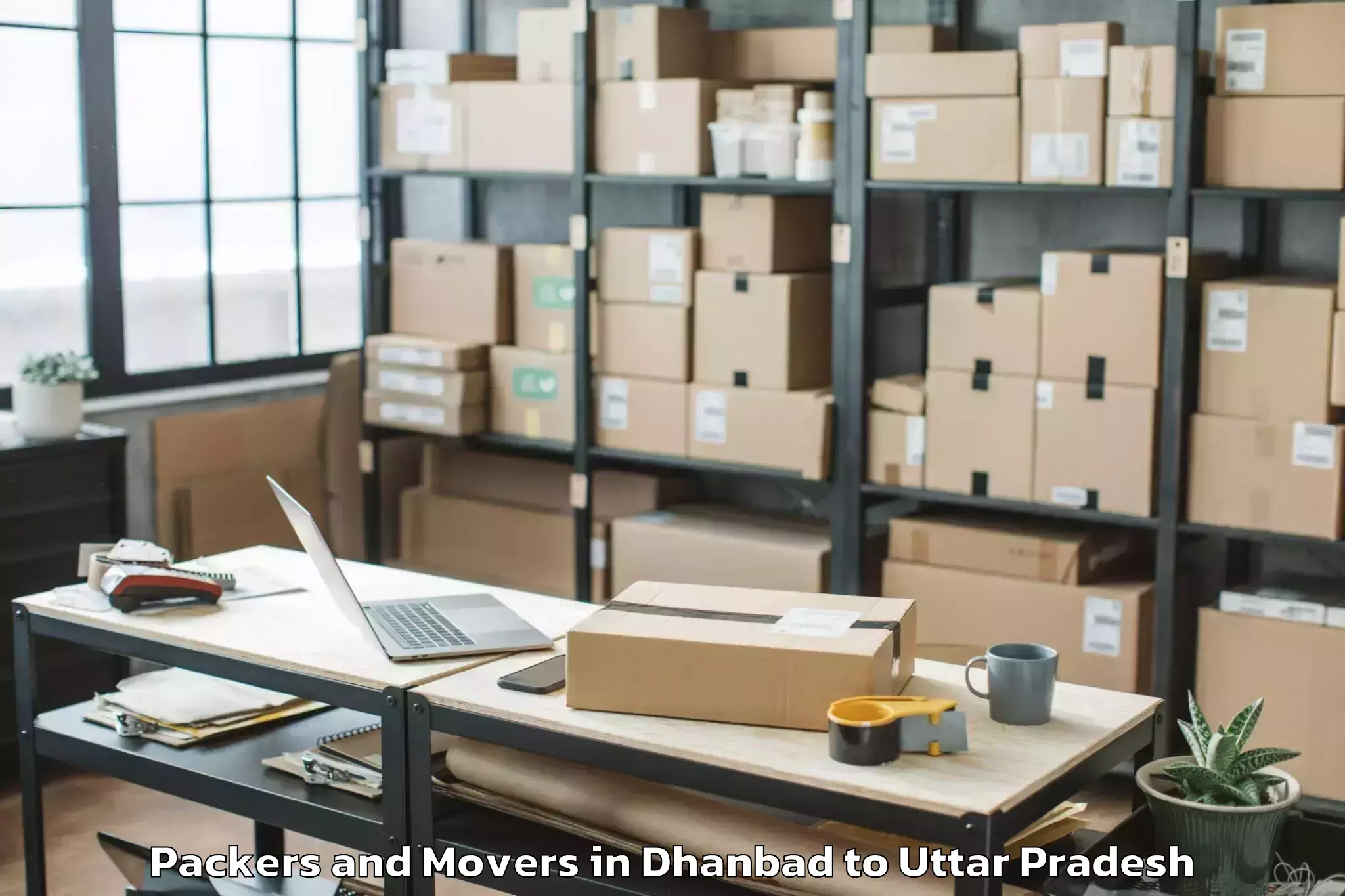 Quality Dhanbad to Manjhanpur Packers And Movers